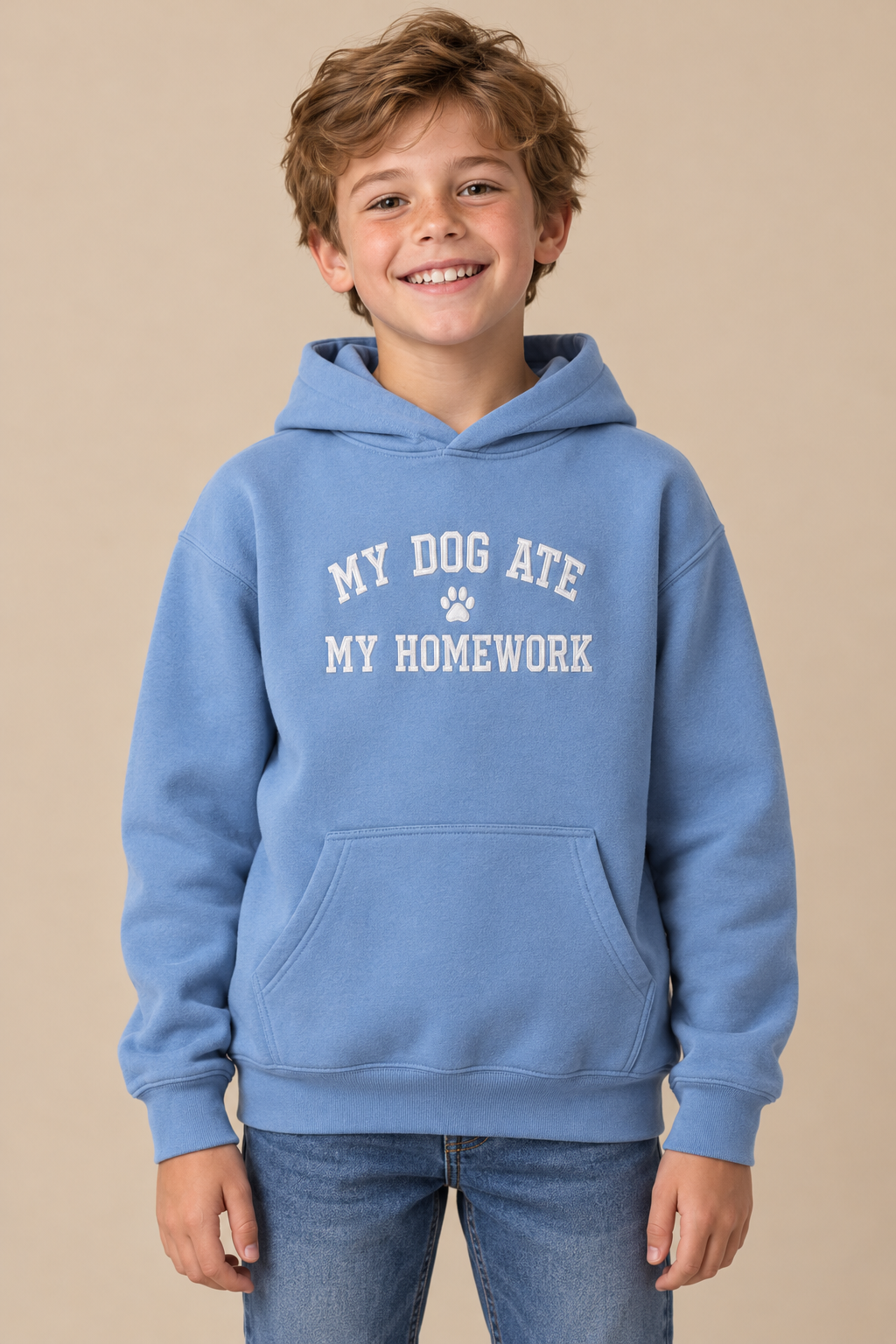 Child wearing a light blue My Dog Ate My Homework embroidered hoodie