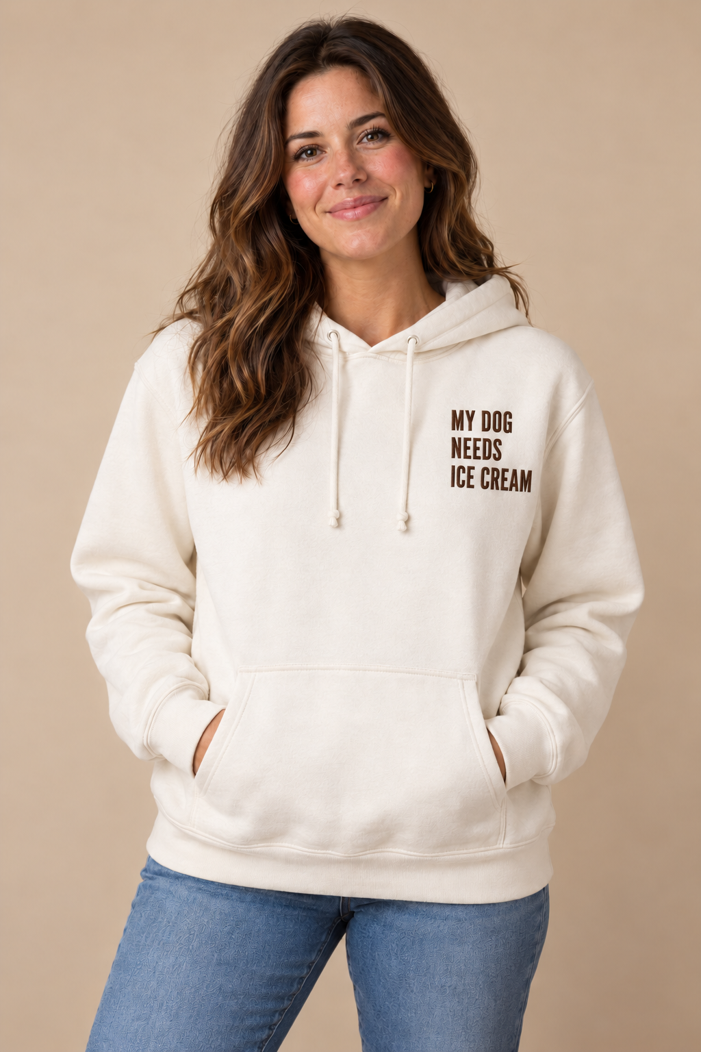 Woman wearing a bone My Dog Needs Ice Cream embroidered hoodie